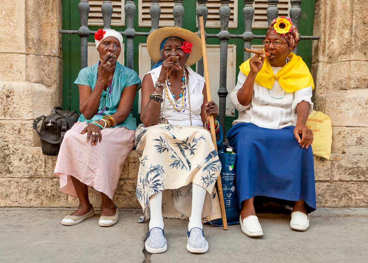 three cuban women smoking cigars