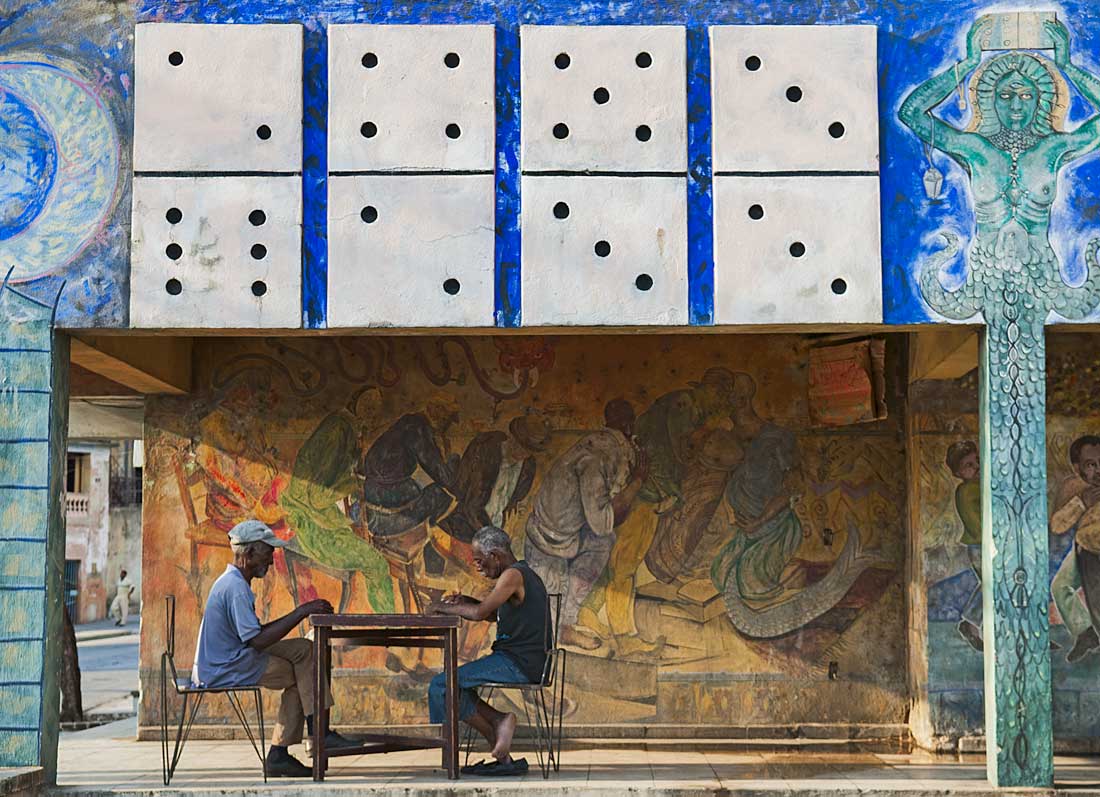 Cuban men playing dominos, Santiago de Cuba – Photo: Shutterstock