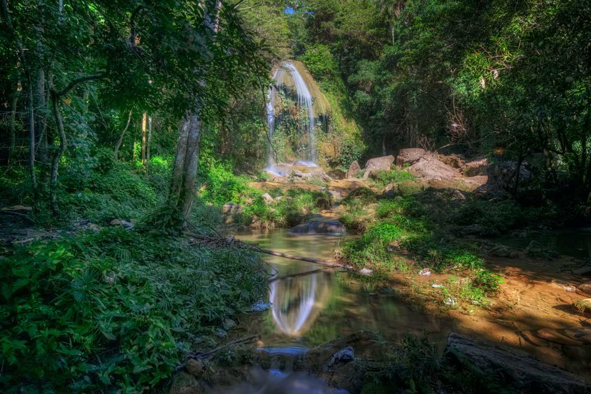 waterfall in tropical forest environment
